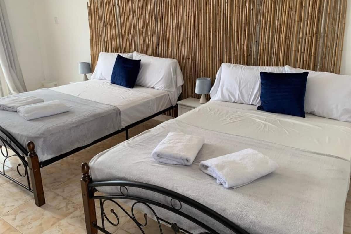 deluxe double or twin room, 2 queen beds | 1 bedroom, individually decorated, individually furnished, desk