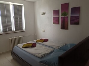 2 habitaciones, wifi gratis y ropa de cama 