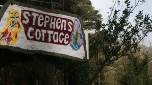 A sign for Stephen's Cottage with a floral design. - The perfect place to take a step back from it all (Renvyle)