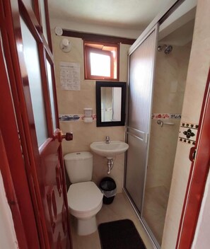 Shower, towels, soap, toilet paper
