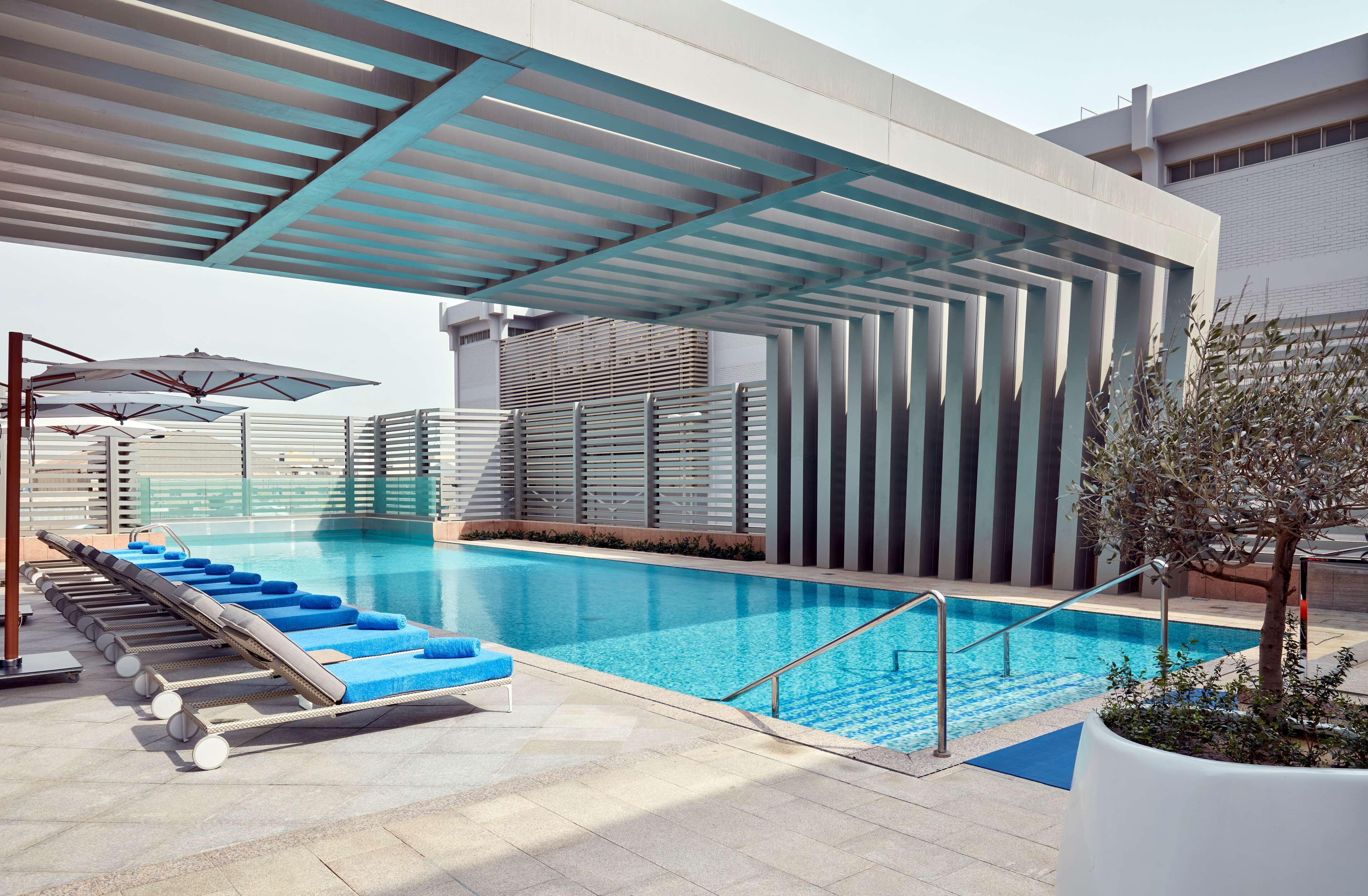 2 outdoor pools, pool umbrellas, pool loungers