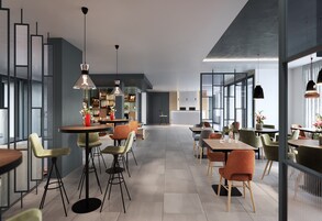 Un área de comedor moderna con mesas altas, sillas e iluminación colgante.