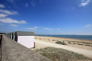 Guests can enjoy access to the beach from these beach huts.