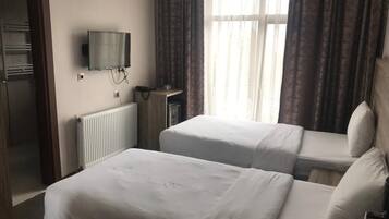 Double or Twin Room | Minibar, desk, laptop workspace, free WiFi