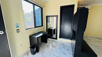 Deluxe Quadruple Room | Desk, blackout drapes, free WiFi