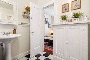 Bathtub, hair dryer, towels