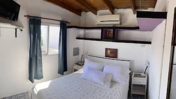 1 dormitori, planxa i posts de planxar, wifi gratuïta i roba de llit
