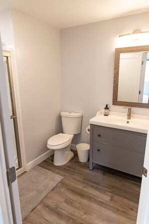 Bathtub, hair dryer, towels