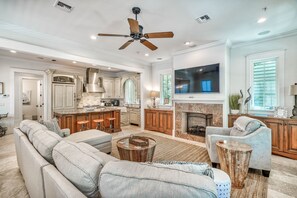 Flat-screen TV, fireplace, DVD player, foosball