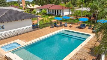 Outdoor pool, open 9:00 AM to 11:00 PM, sun loungers