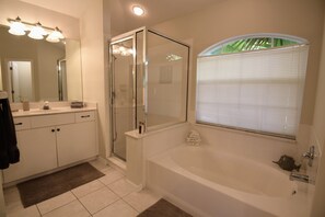 Combined shower/tub, hair dryer, towels, toilet paper