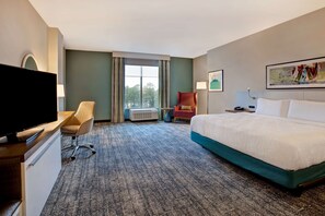 Premium bedding, desk, laptop workspace, iron/ironing board