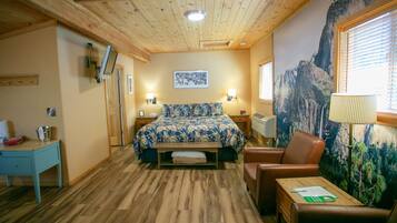 Suite estudio, 1 cama de matrimonio grande, cocina | 1 dormitorio, decoración individual, tabla de planchar con plancha