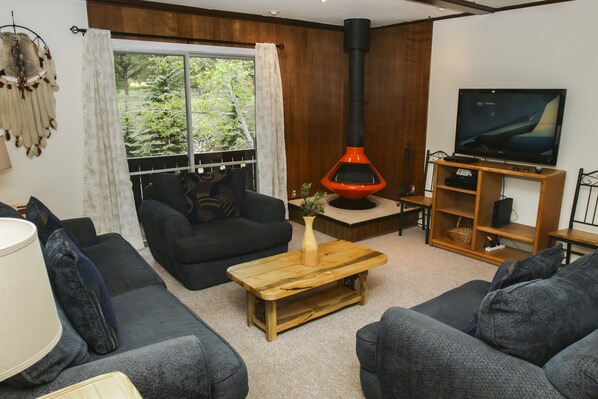 Condo, Multiple Beds, Private Pool, River View | Living room | 42-inch TV with cable channels, fireplace - Fawn Valley Inn: 228 (Estes Park)
