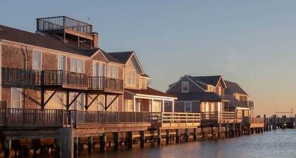On the wharf. XXL private deck on the water. In town yet very quiet.