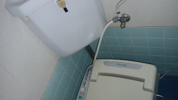 Futami Terrace C | Bathroom | Combined shower/tub, hair dryer, slippers, towels