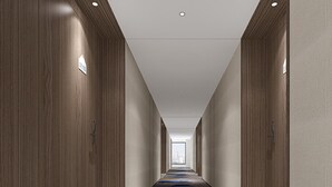 A long, narrow hotel corridor with wooden paneling on the walls, a carpeted floor, and a city view through the windows. - Holiday Inn Express Ningbo City Center by IHG (Ningbo)