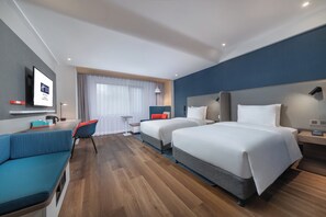 A hotel room with two beds, a desk, a chair, and a TV. - Holiday Inn Express Ningbo City Center by IHG (Ningbo)
