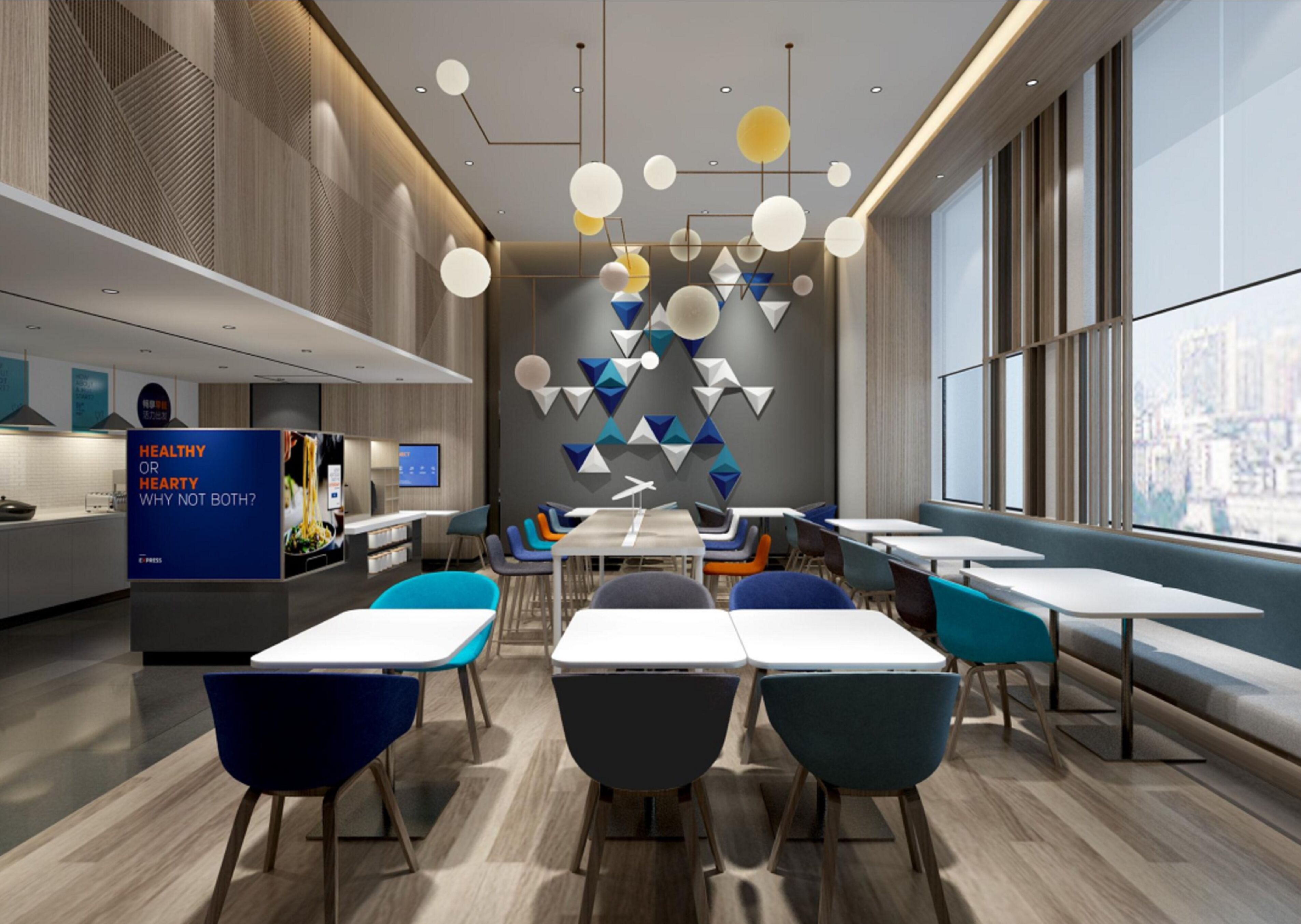 A modern dining area with a mix of seating options, a visible kitchen area, and a cityscape view through large windows.