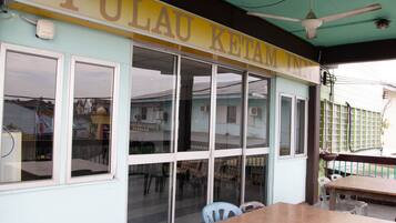 Enjoy meals in the dining area with a table and chairs.