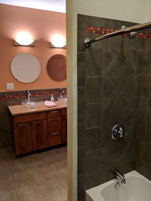 Combined shower/tub, hair dryer, towels, soap