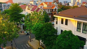 A residential area with a variety of house styles, including traditional and modern architecture. - Nhu Y Hotel (Ho Chi Minh City)