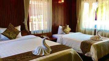 Deluxe-Zweibettzimmer | 18 Schlafzimmer, Daunenbettdecken, individuell dekoriert