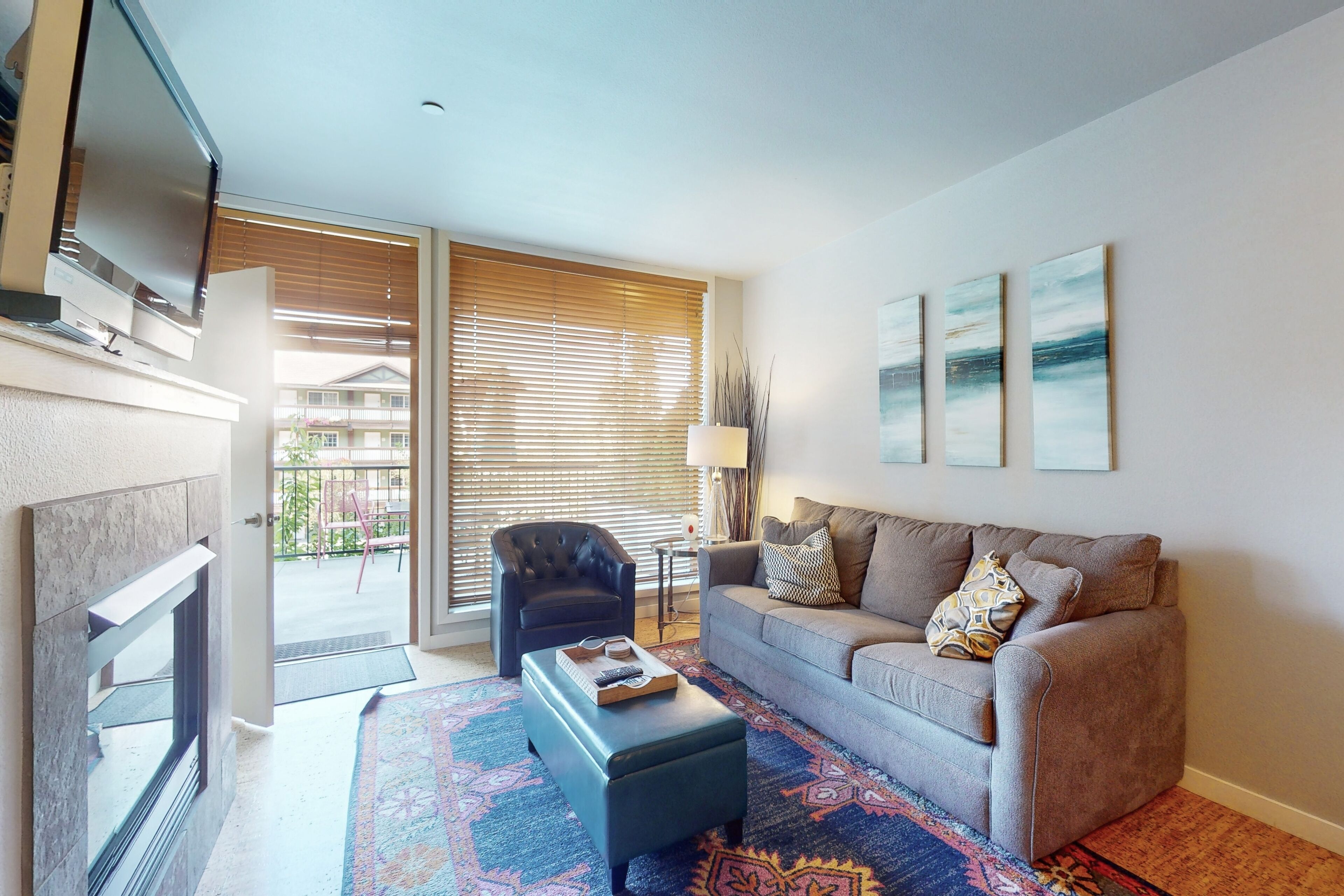 Cozy & modern condo w/ private balcony, shared pool & hot tub - walk to the lake