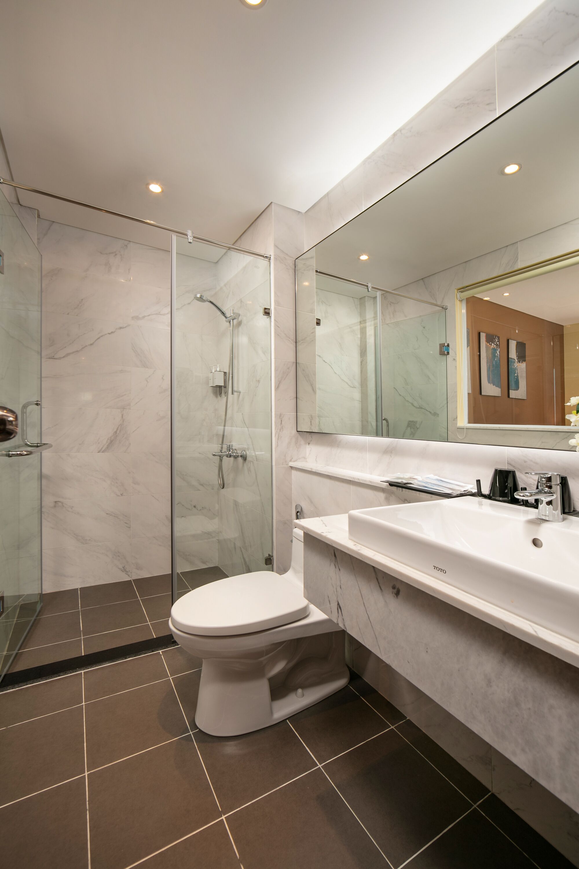 classic twin room | bathroom | shower, rainfall showerhead, designer toiletries, hair dryer