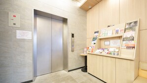 An elevator with a control panel and emergency instructions. - Rakuten STAY URBAN Shijo Kawaramachi (Kyoto)