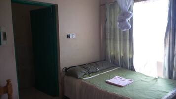 Twin Room | Memory foam beds, desk, blackout drapes, free WiFi