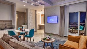 Penthouse | Living room | 32-inch LED TV with cable channels, TV