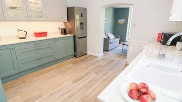 Cottage | Private kitchen | Microwave, stovetop, dishwasher, highchair