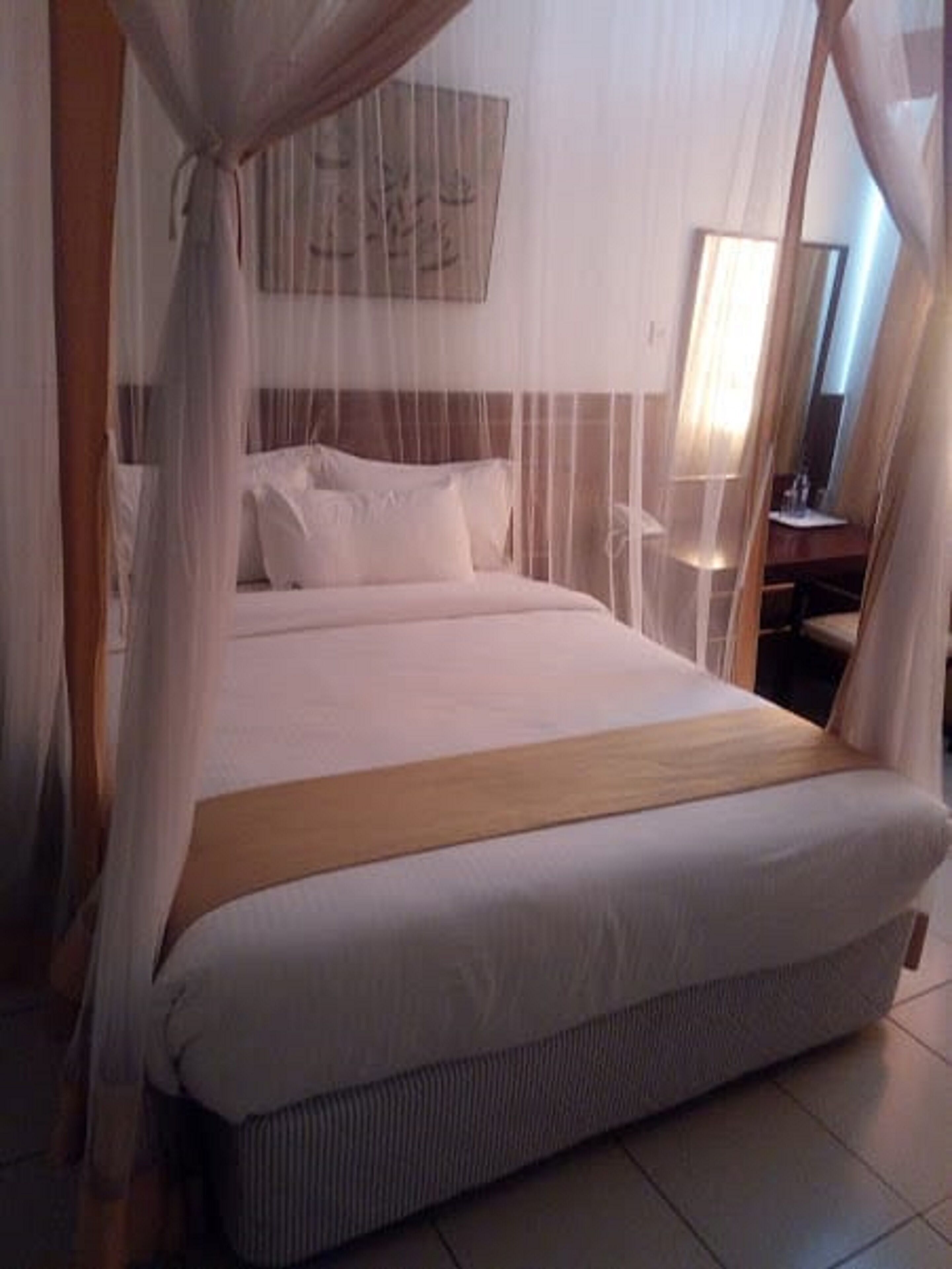 Desk, laptop workspace, blackout drapes, free WiFi