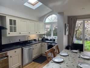 Cottage | Private kitchen | Dishwasher, cookware/dishes/utensils - Pedaller's Cottage (Weymouth)