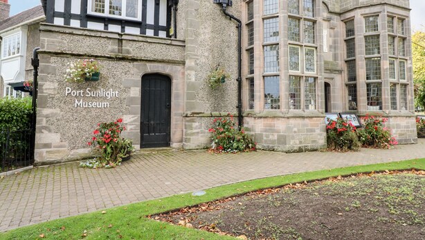 A historic building with a sign reading "Port Sunlight Museum." - Sunlight Soap Cottage (Wirral)