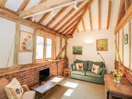 Cottage | Woonkamer | Televisie en een dvd-speler