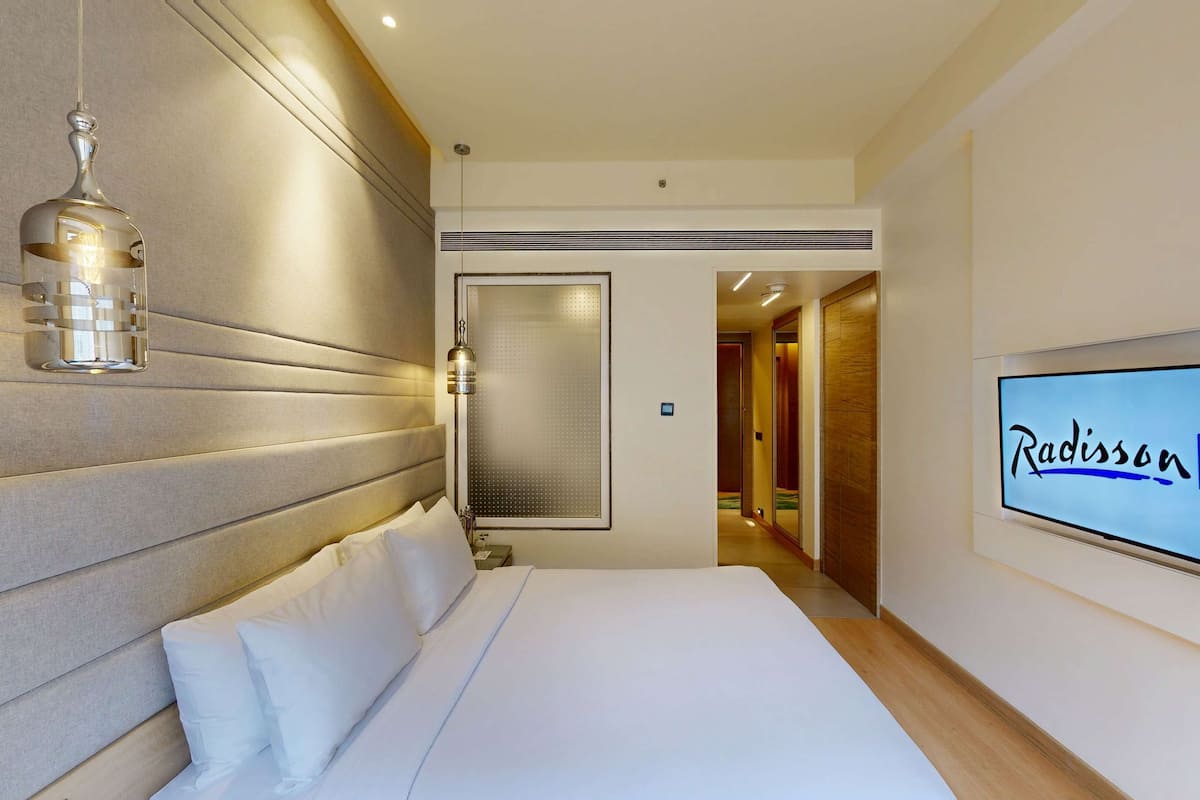 Superior kamer | 1 slaapkamer, een minibar, een kluis op de kamer, een bureau