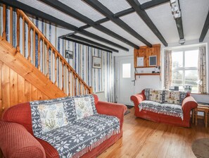 Cottage | Living area | TV, fireplace - Cae Person (Beaumaris)