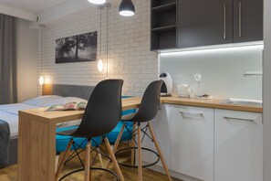 Apartment, 1 King Bed | Living area | 42-inch Smart TV with digital channels, Netflix, streaming services - Native Apartments Augustiańska 24 (Kraków)