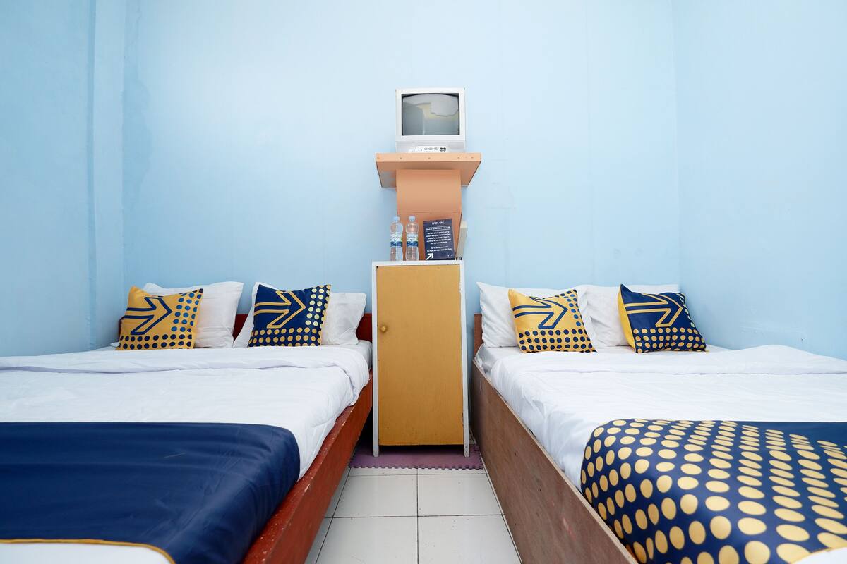 Habitación familiar | Escritorio, wifi gratis, ropa de cama
