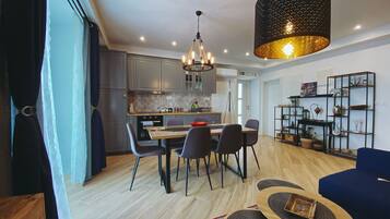 Residence Apartment 2 | Living area | Flat-screen TV