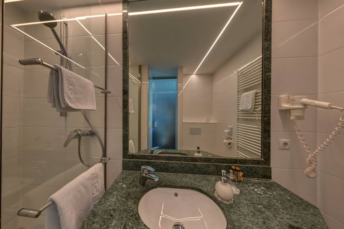 single room | bathroom | slippers, towels