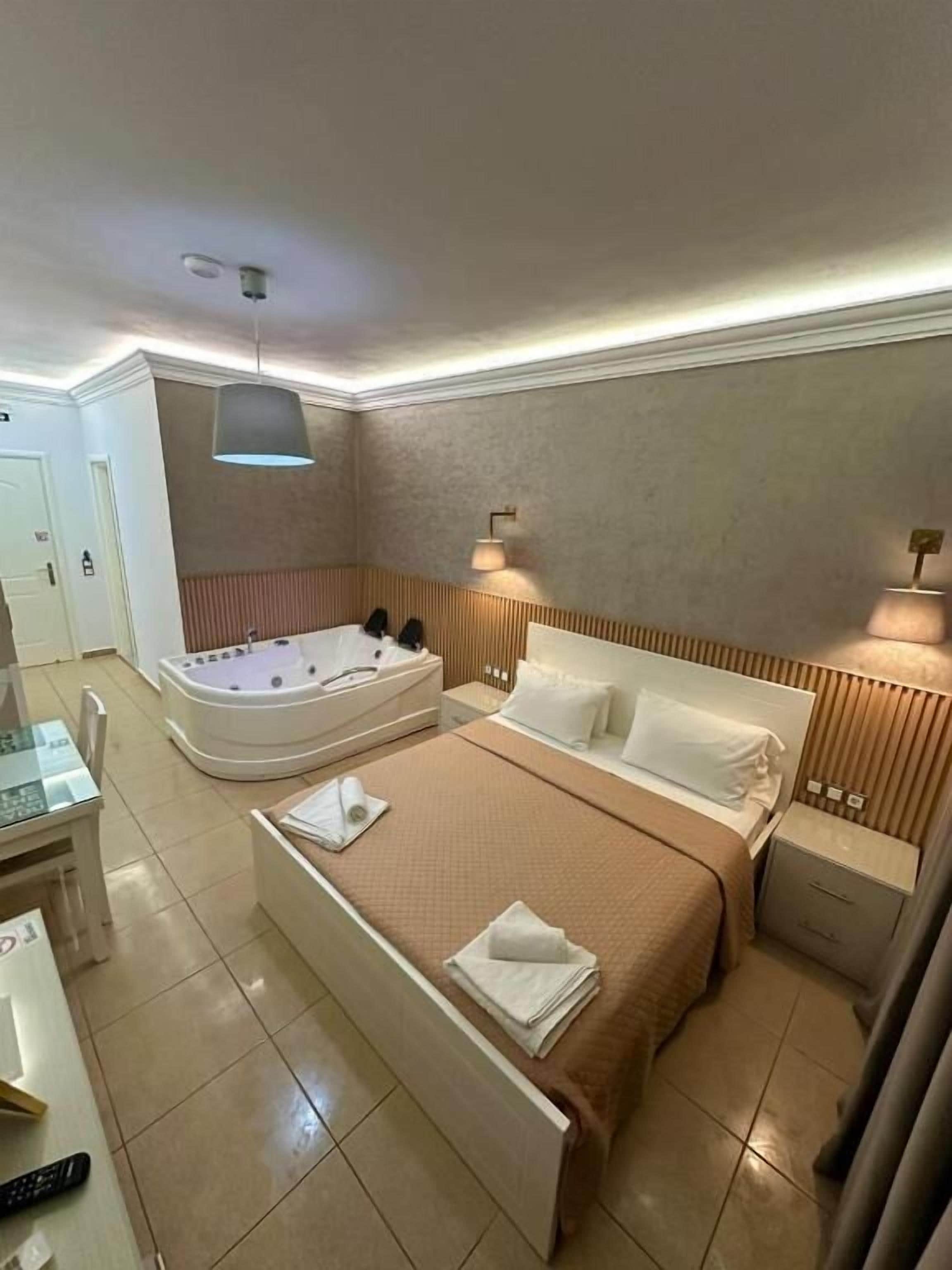 Chambre Double Deluxe, bain à remous, vue mer | Coffres-forts dans les chambres, bureau, chambres insonorisées