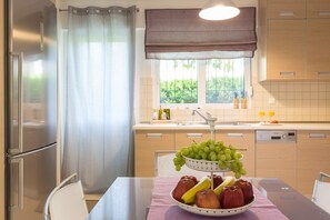 Apartment | Private kitchen | Full-size fridge, microwave, oven, stovetop - New Stylish Apartment with Sea View (Saronikos)