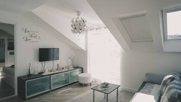 Apartment, 2 Bedrooms, Pool Access | Living room | Flat-screen TV