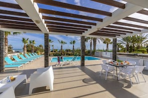 Outdoor dining - A Truly Spectacular First-Line Sea Front Villa in the beautiful village of Pervolia (Perivolia)