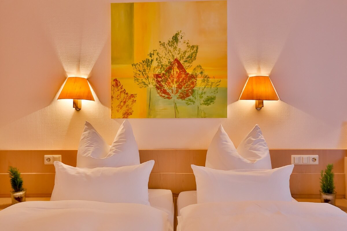 Hypo-allergenic bedding available, down comforters, desk