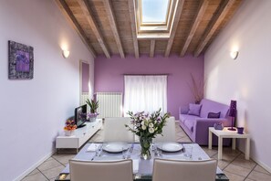 Deluxe Apartment, 1 Bedroom, City View, Tower | Living area - Flowers Apartments (Desenzano del Garda)