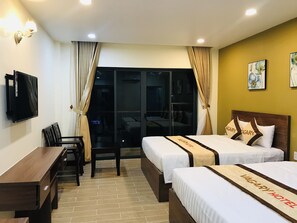 Family Room, Balcony | Minibar, in-room safe, desk, laptop workspace - Vagary Hotel (Phu Quoc)